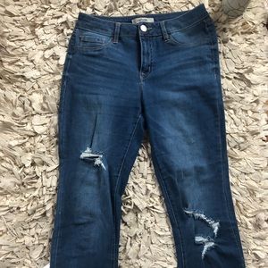 Dark washed little ripped jeans